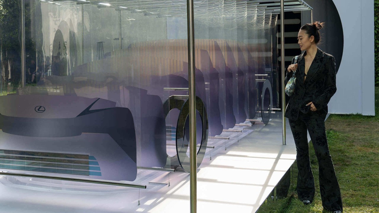 A person stood next to Lexus LF-ZC art at the Milan Design Week 2024