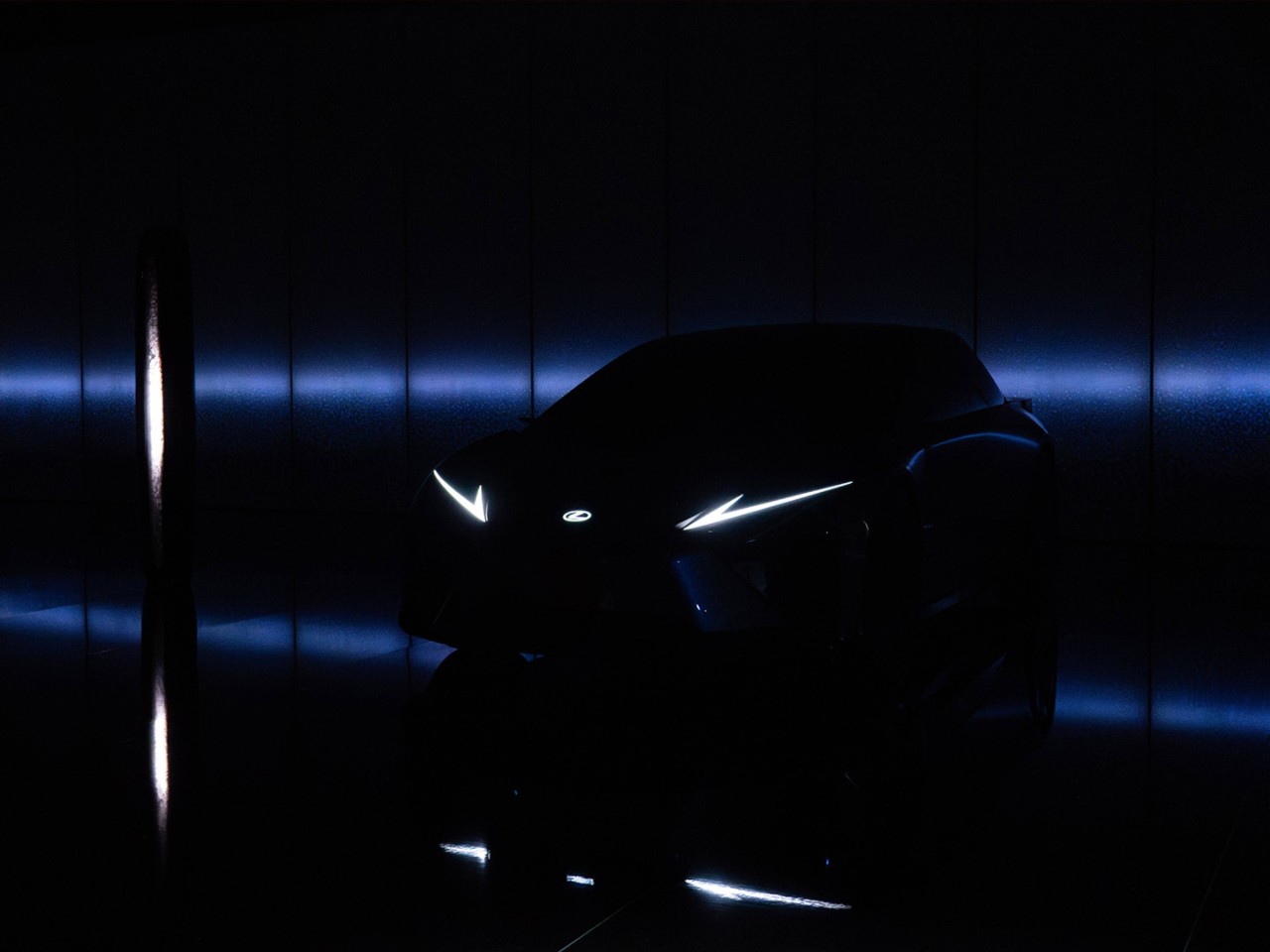 A Lexus parked in the dark