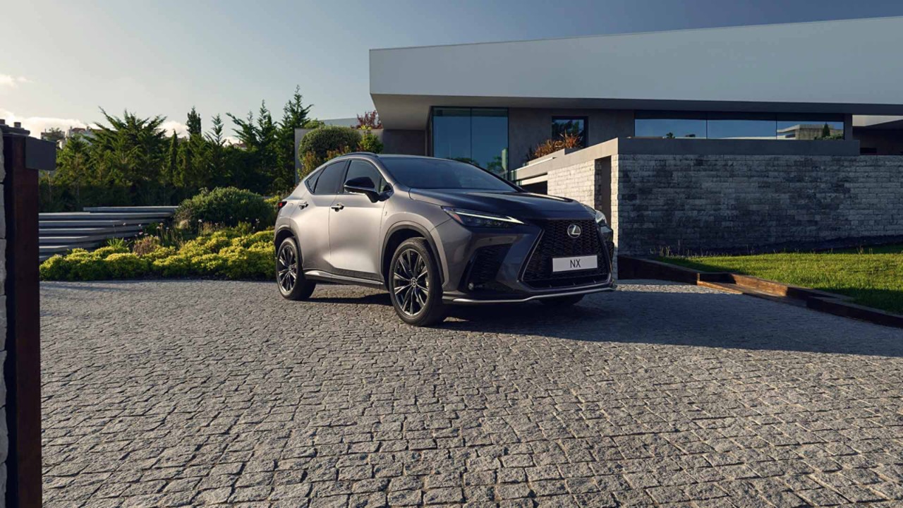 A Lexus NX parked outside a property