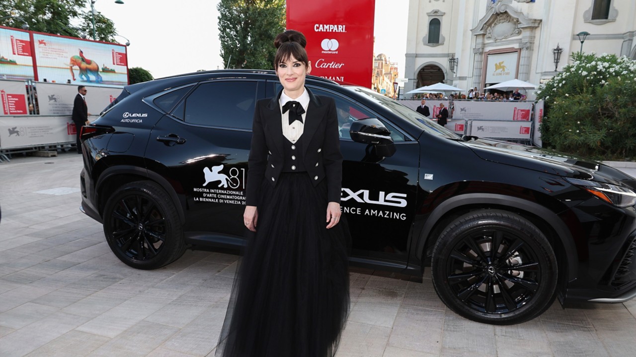 Winona Ryder stood in front a Lexus at the Venice Film Festival